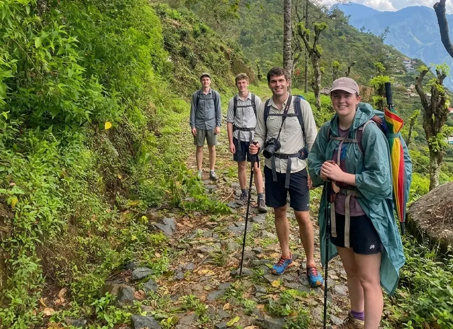 Thiwanka guiding guests on a nature trekking tour along Sri Lanka's Pekoe Trail through lush tea country